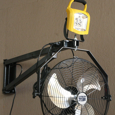 LED garage light installed on a Maxx Air dock arm with wall mount fan adds additional bright lighting to a room without taking up extra space.